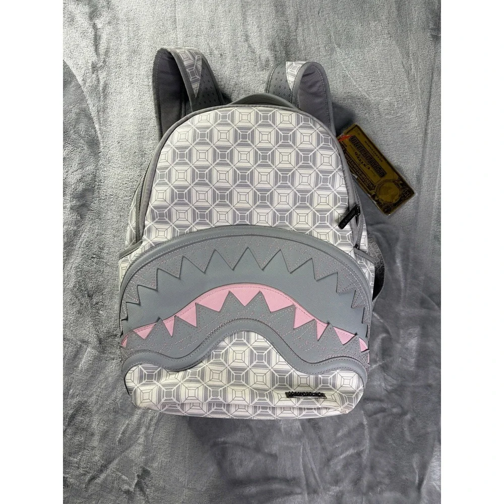 Sprayground A.I. African Intelligence DBX Sandflower Hiking Backpack Gray Pink